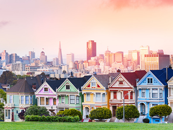 painted houses in San Francisco, with skyscrapers in background
